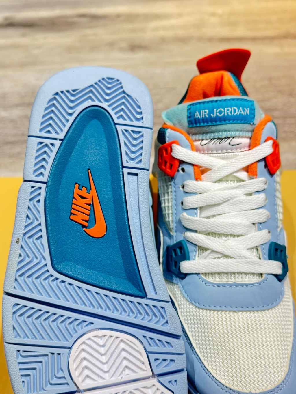 Air Jordan 4 Azul Claro Naranja