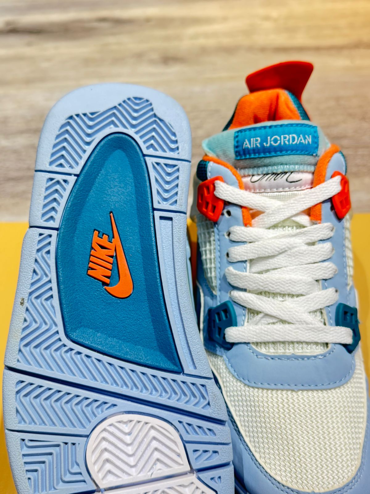 Air Jordan 4 Azul Claro Naranja