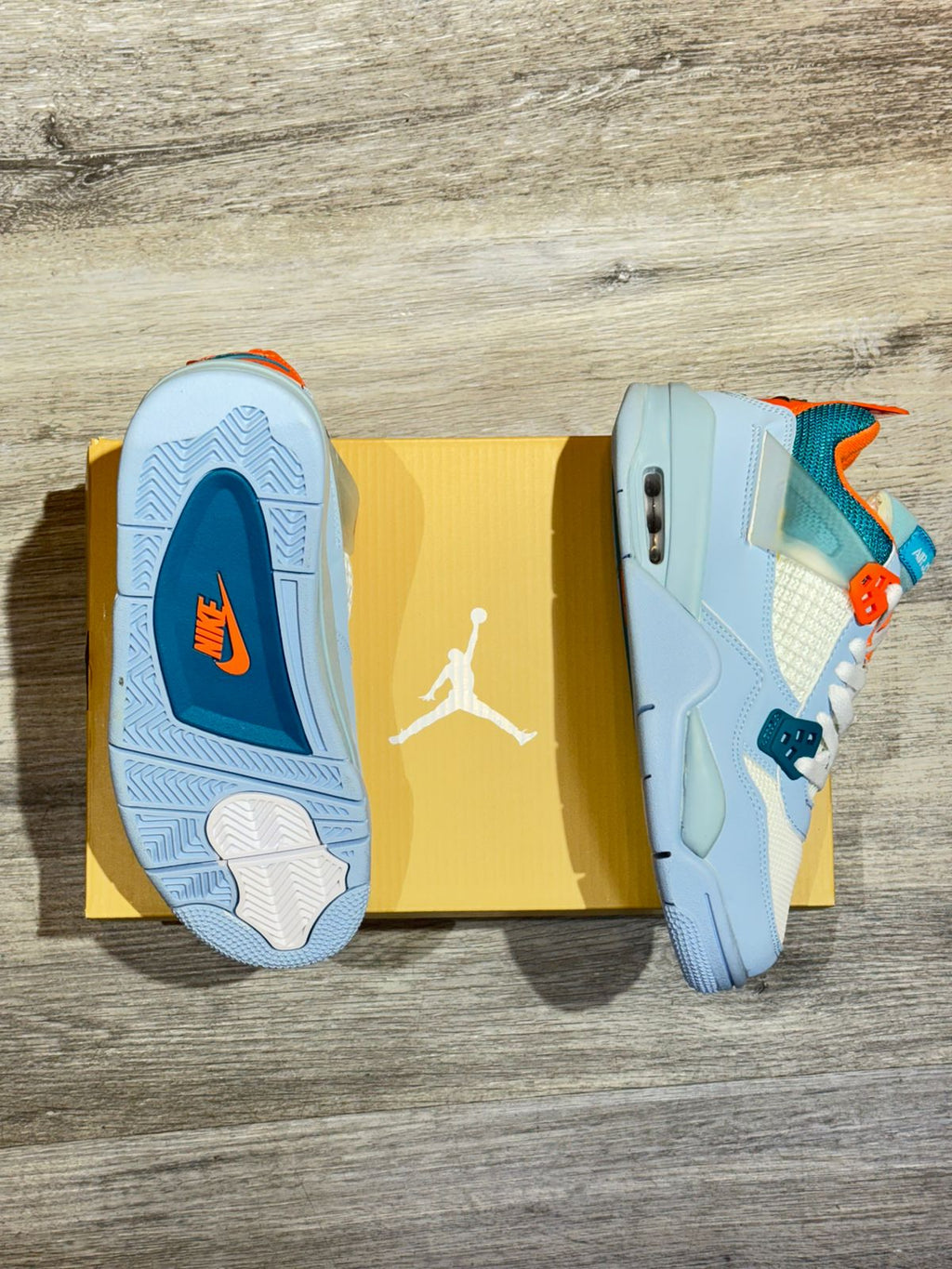 Air Jordan 4 Azul Claro Naranja
